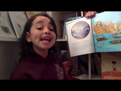Emilio reading 'Pearl Fairweather, Pirate Captain', written by Jayneen Sanders.